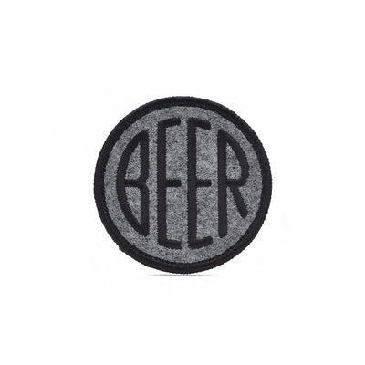 Embroidered BEER patch with black embroidery thread on heather grey felt