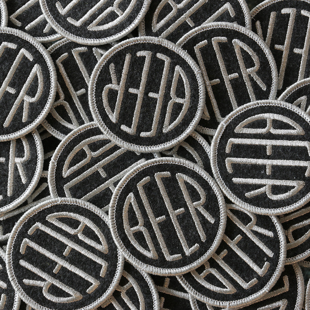 Embroidered BEER patch with metallic silver embroidery thread on black heather felt