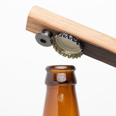 Quercus Alba Reclaimed Wood Bottle Opener with removed cap held by embedded cap catching magnet