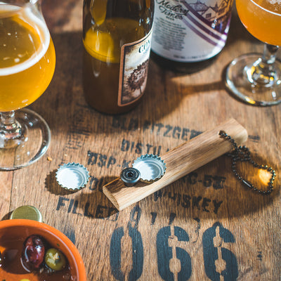 Quercus Alba Reclaimed Wood Bottle Opener in use bottle share